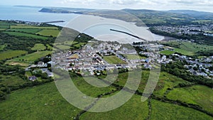 overlooking Stop and call and habour village and Fishguard with a Drone