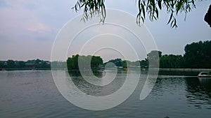 overlooking the yanqi lake and the pavilion in the distance