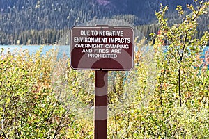 An overnight camping and fires are prohibited sign