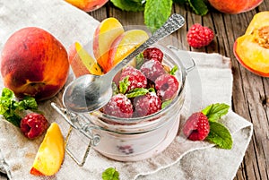 Overnight oatmeal with raspberries and peach