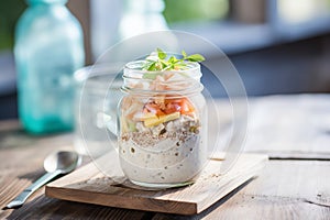 overnight oats in an airtight jar on a rustic table