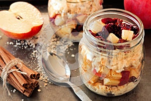 Overnight oats with apples and cranberries in a mason jar