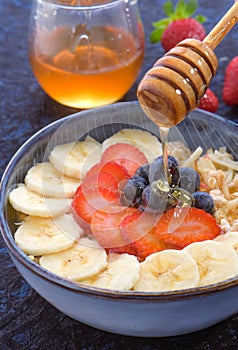 Overnight oats with berries and honey photo