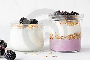 Overnight oats or healthy breakfast parfait with yogurt and berries