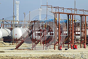 Overpass loading of oil products and fuel storage vessels