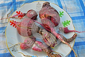 Overripe red radish in a plate