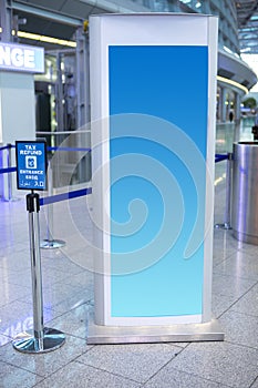 Holiday travel, airport, exit hall, information light boxes, billboards