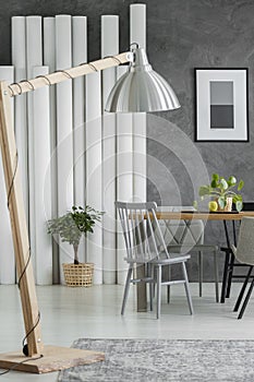 Oversize lamp in dining room