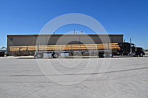 Oversize load of logs on a trailer
