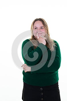 oversized beautiful young girl arms crossed hand on chin and looking side chubby woman standing aside copyspace white background