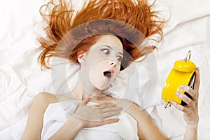 Oversleep girl in bed photo