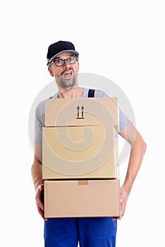 Overstrained postman with parcels