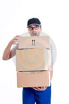 Overstrained postman with parcels