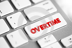 Overtime - amount of time someone works beyond normal working hours, text button on keyboard