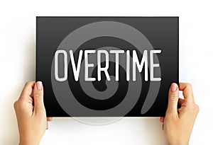 Overtime - amount of time someone works beyond normal working hours, text concept on card