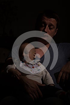 Overtired single father with his son