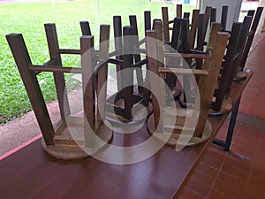 Overturn stool on wooden table