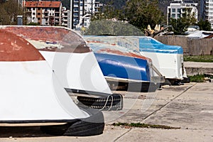 Overturned boats on a sidewalk near Old Town Budva