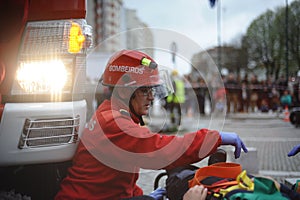 Life saving firefighter with tired expression