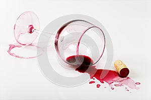 Overturned glass of wine