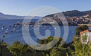 Overview of the buildings, the beach and the nature of Corcubion, a landmark village along the Camino de Santiago, Spain.