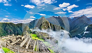 Overview of Machu Picchu, agriculture terraces and Wayna Picchu peak in the background