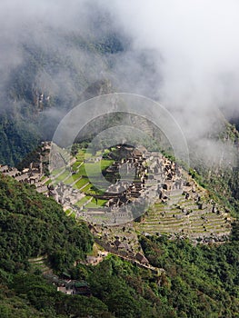 Overview of Machu Picchu with clouds, Peru