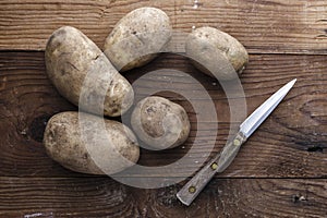 Overview of potatoes and a knife