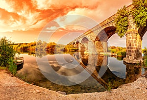 Overview at sunset of the Ancient Bridge of Orosei on the river Cedrino, Sardinia