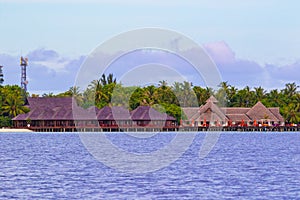 Overwater bungallows Olhuveli island resort Maldives