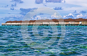 Overwater bungallows resort Olhuveli island Maldives