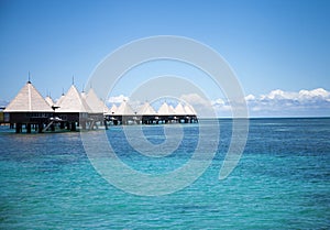 Overwater bungalows at paradise beach resort