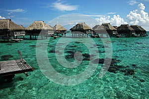 Overwater bungalows in South Pacific