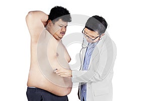 Overweight man checkup in hospital 2