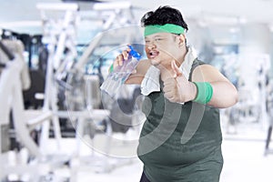 Overweight man drinking water 2