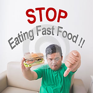 Overweight man stop eating junk food