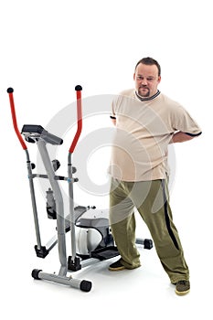 Overweight man stretching his back