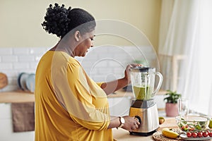 Overweight Woman Cooking at Home Side View