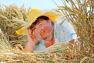 Overweight woman enjoying life during summer vacations.