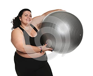 Overweight woman with fit ball