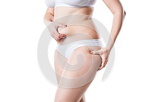 Overweight woman with flabby belly and fat hips, obesity female body isolated on white background