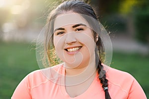 overweight woman imperfect body outdoors park