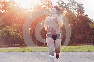 Overweight woman running. Weight loss concept.