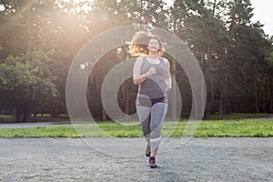 Overweight woman running. Weight loss concept.