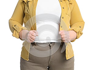 Overweight woman in tight clothes on white background, closeup