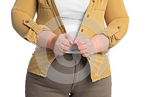 Overweight woman in tight clothes on white background, closeup