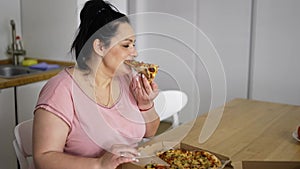 Overweighted woman eats with great pleasure, woman eats pizza, food