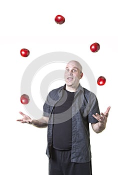Overwelmed man juggling too many things