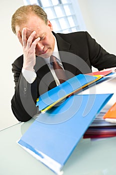 Overworked businessman photo