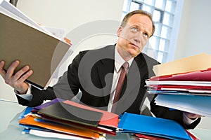 Overworked businessman photo